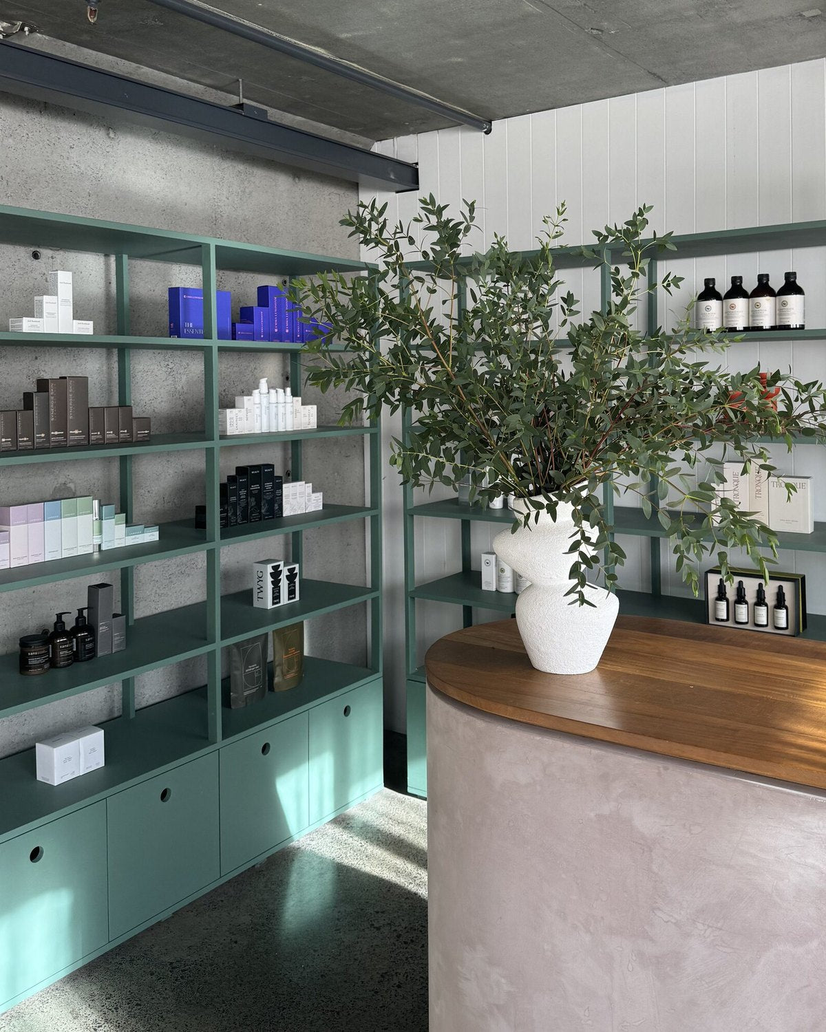 The retail shelves and front counter at The Facialist studio